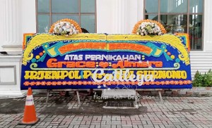 bunga papan Medan gandeng selamat bahagia