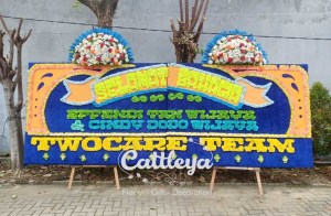 bunga papan Medan gandeng selamat bahagia